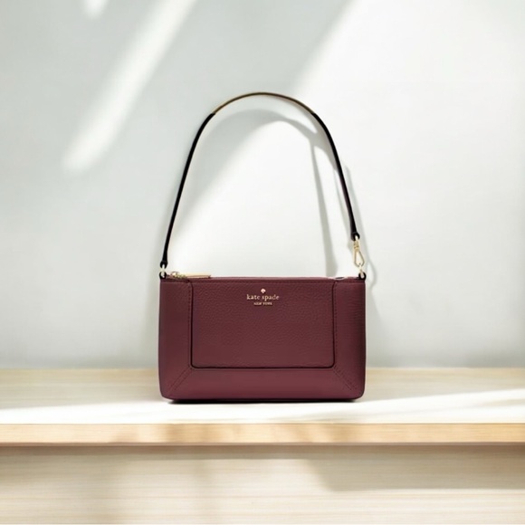Kate Spade cherrywood-Lena convertible wristlet-4.52”x7.68”x1.6”-Retail $185 - Picture 1 of 4
